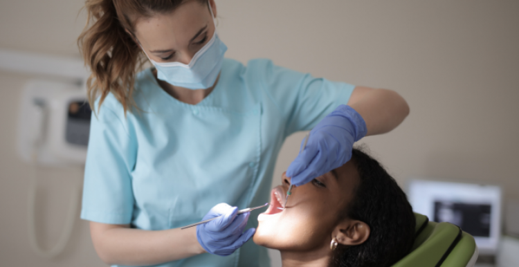 Woman having dental work done