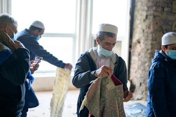 Group of Muslim men preparing for prayer