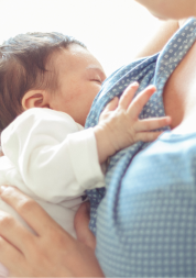 A mother breastfeeding her baby